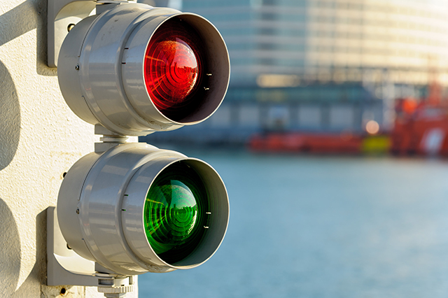 Traffic signal for boats at marina in Bacelona.